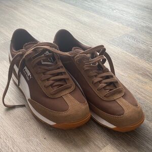 Puma women’s Puma Easy Rider Brown and White Sneakers